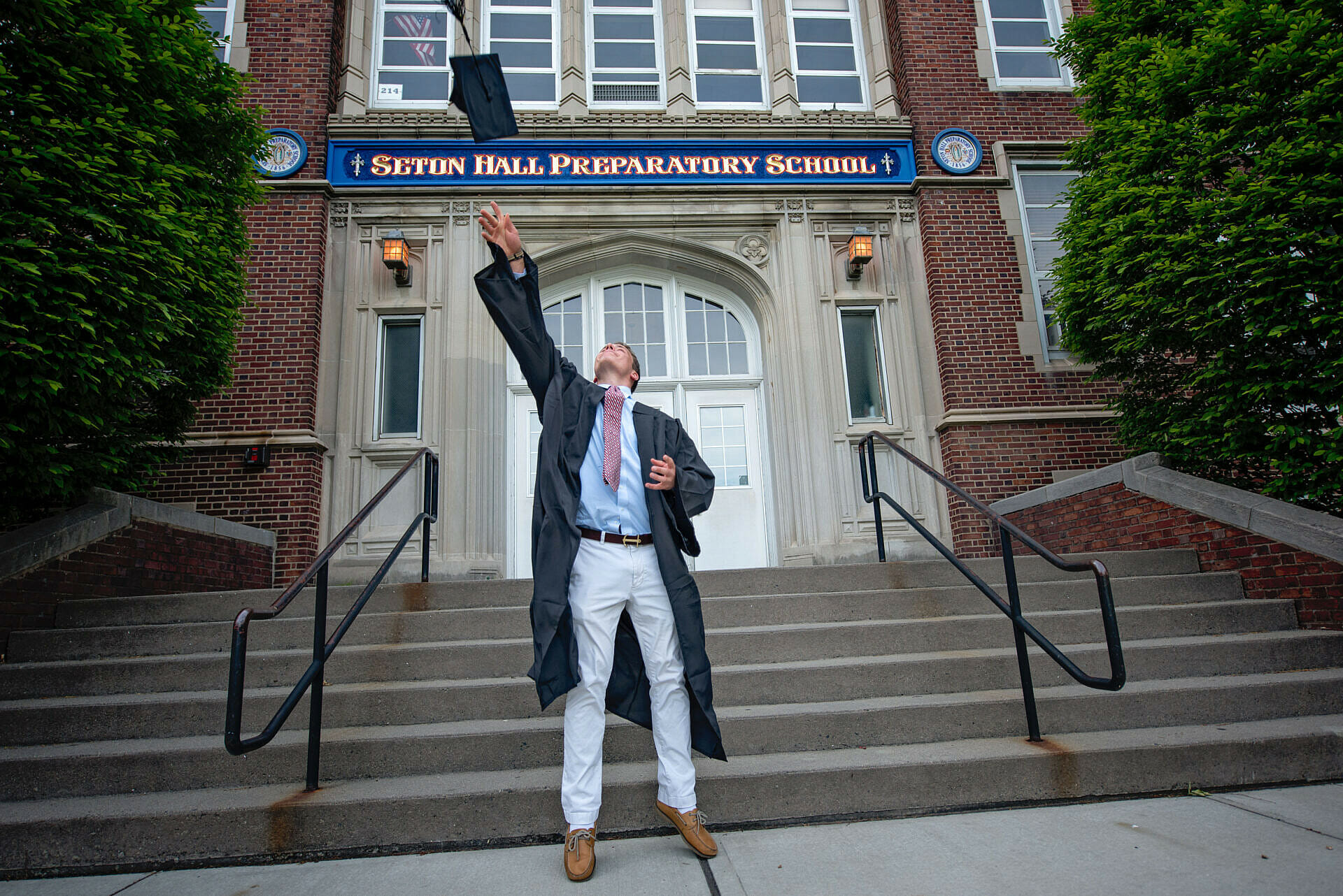Graduation portrait outside Seton Hall by Fenton Films Media